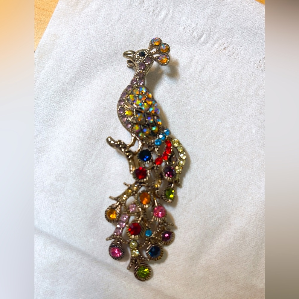 Beautiful and colorful Peacock Brooches
